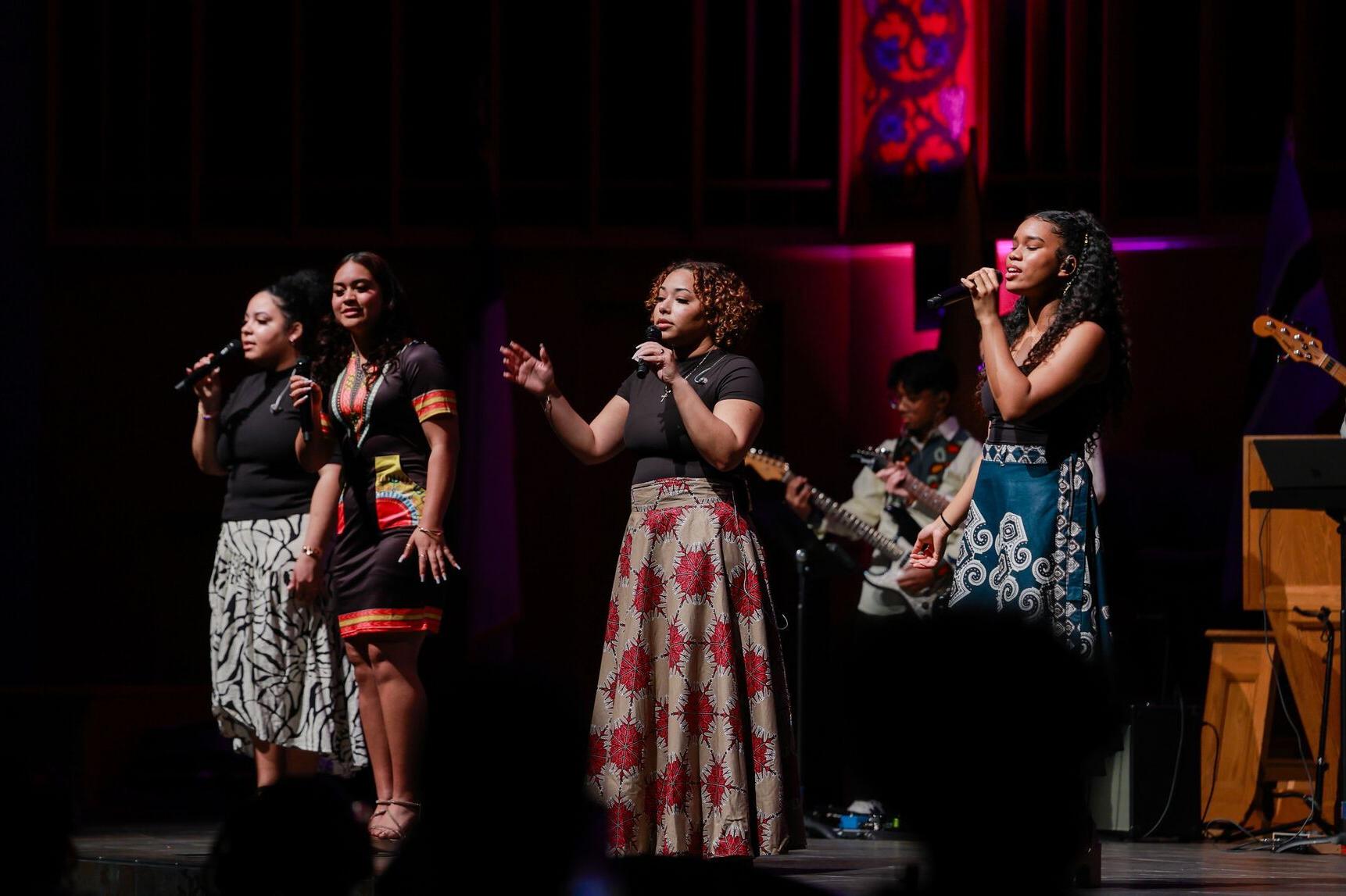 BSCF club members singing on the University Church stage at vespers